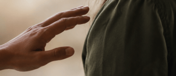 Person reaches out to touch another. Could it be sexual assault?