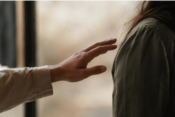 One person reaches out to touch another. Could it be sexual assault?
