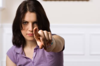 accuser pointing finger