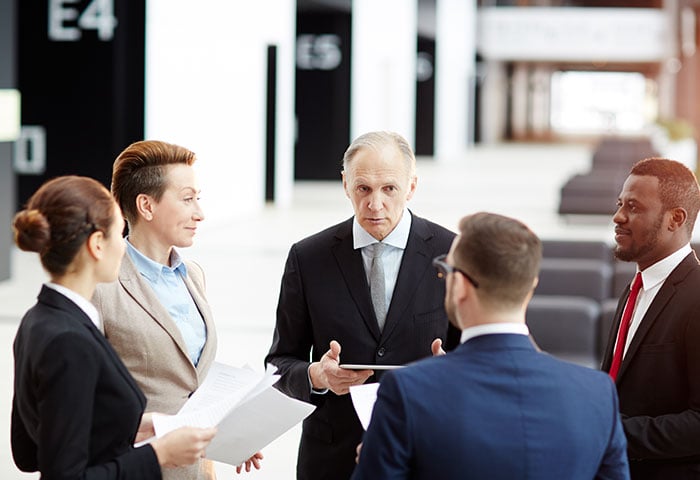 A group of professionals having a discussion.