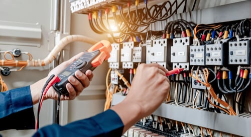 An Image of an electrician working