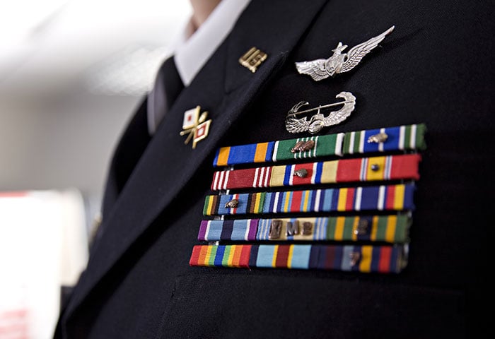 An image focused on the badge of a military personnel