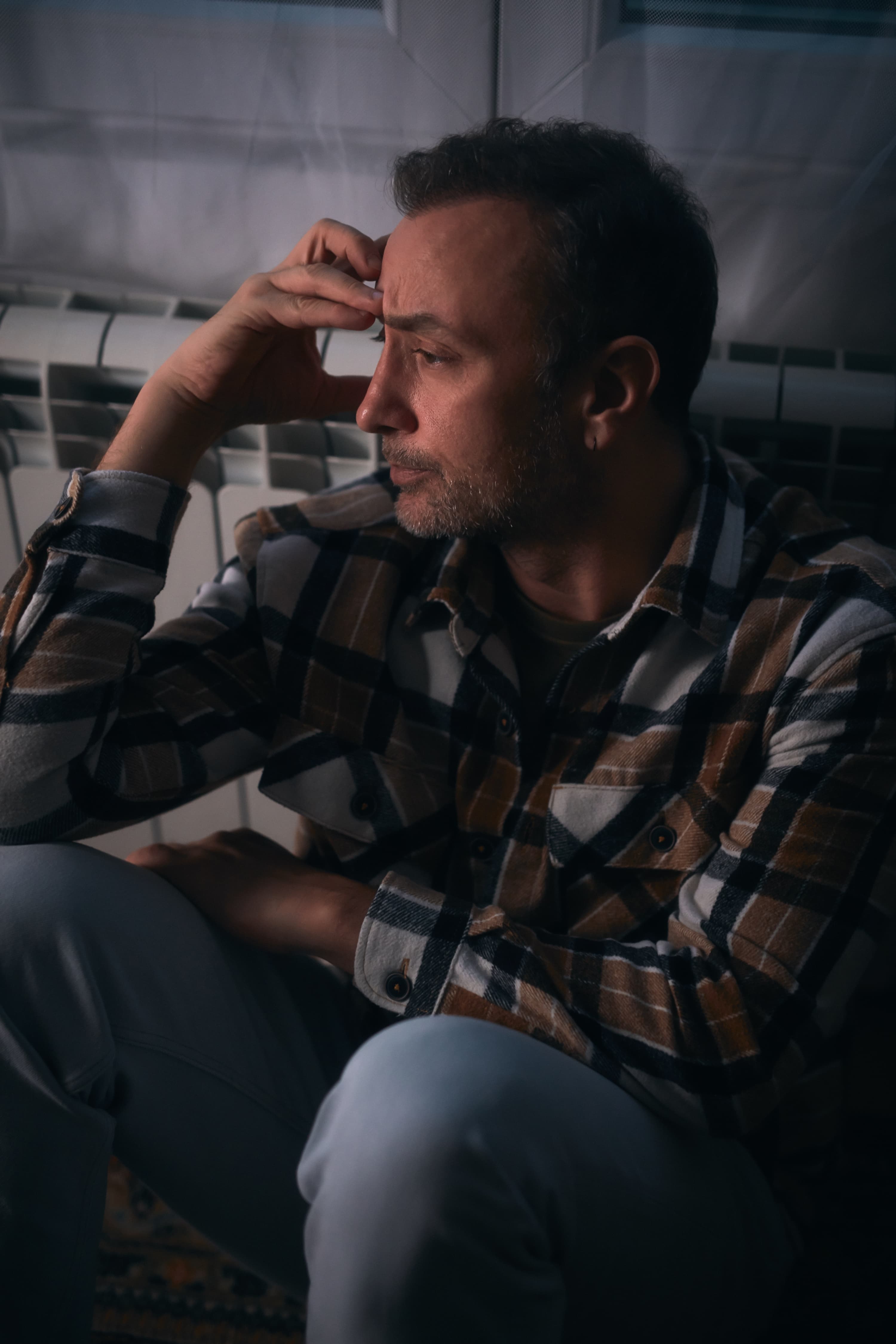 worried-man-sitting-on-the-floor